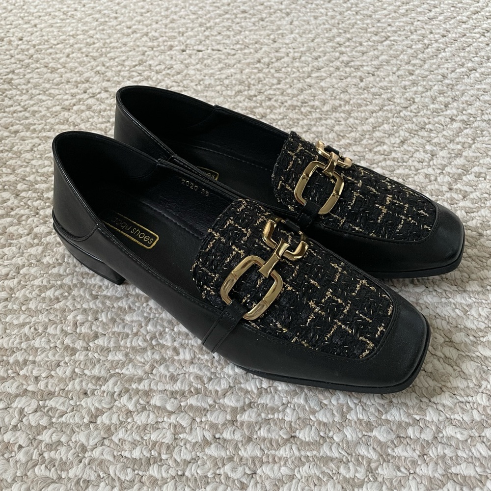 Black tweed flat loafer with gold buckle chanel style